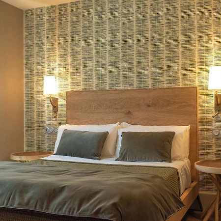 Apartamentos Boutique Fuente Real Comillas Eksteriør billede