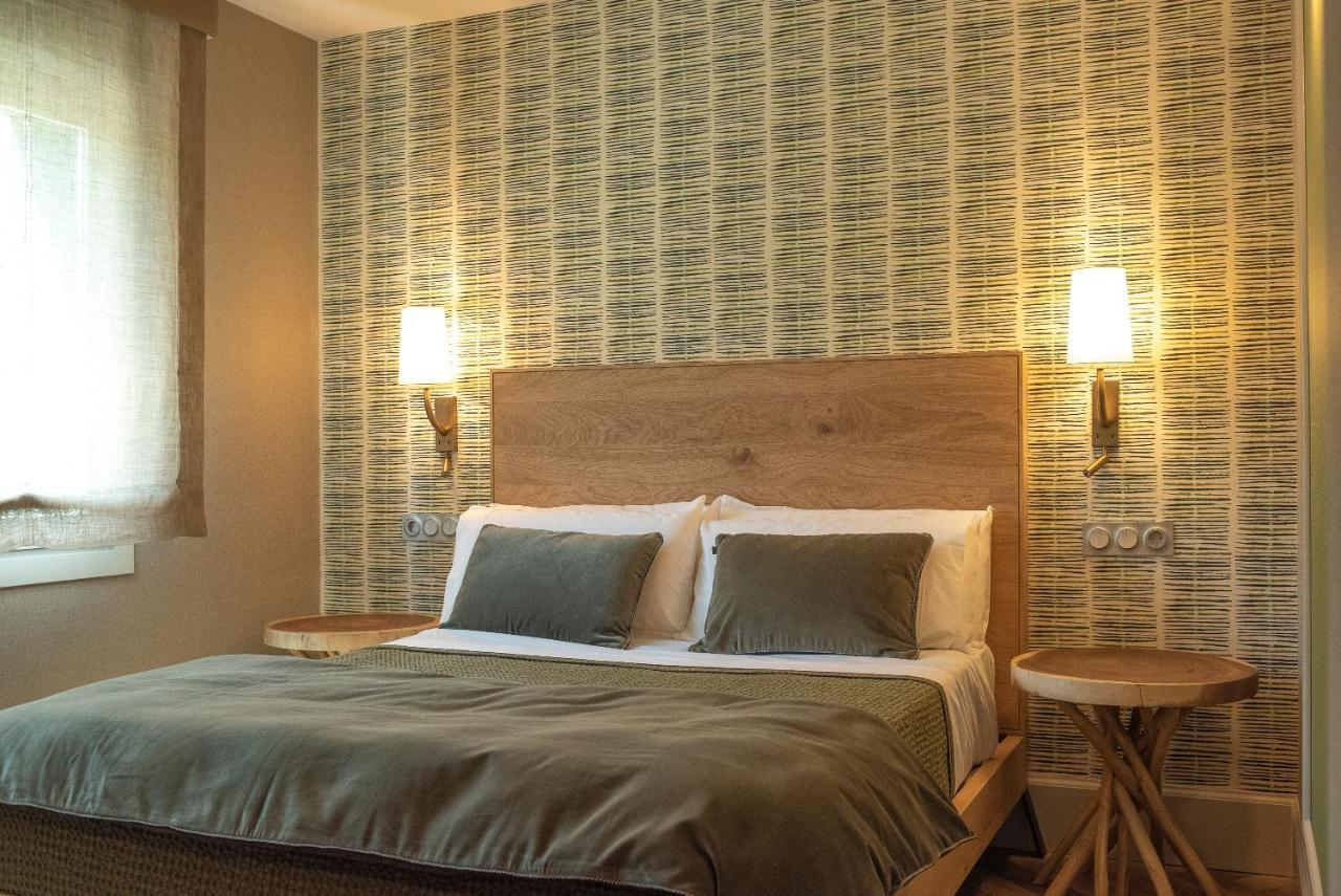 Apartamentos Boutique Fuente Real Comillas Eksteriør billede